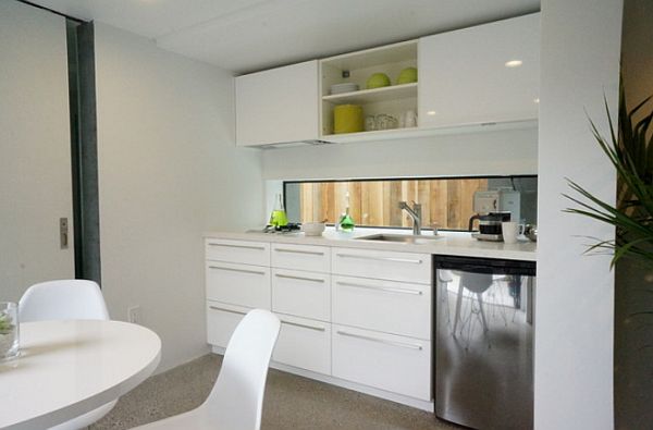 Minimalist small kitchen decor with white furniture
