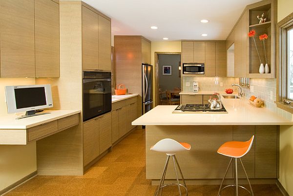 Modern kitchen with fancy cabinets and floating wooden desk