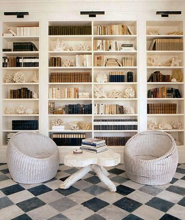 Pristine white home library with matching decor