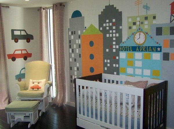 Skyline Blue crib set with a lovely mural as a backdrop