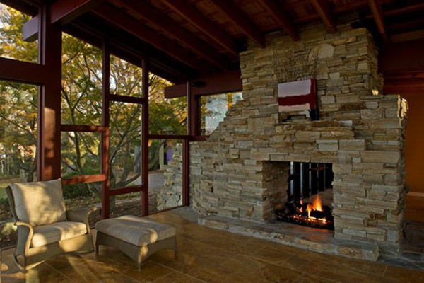 Stone-fireplace-blends-with-the-natural-setting