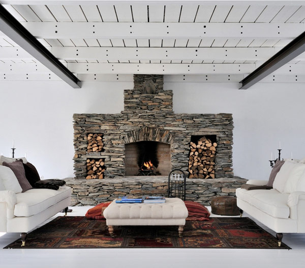 Stone fireplace with storage space for logs