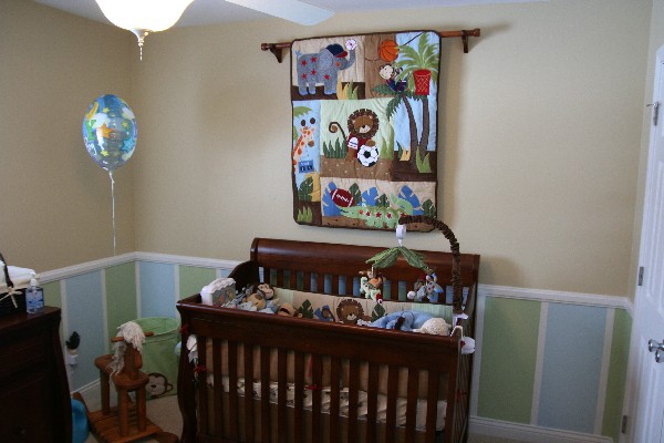 Traditional-yet-coloful-sports-baby-crib-and-bedding-set-for-the-future-football-stars