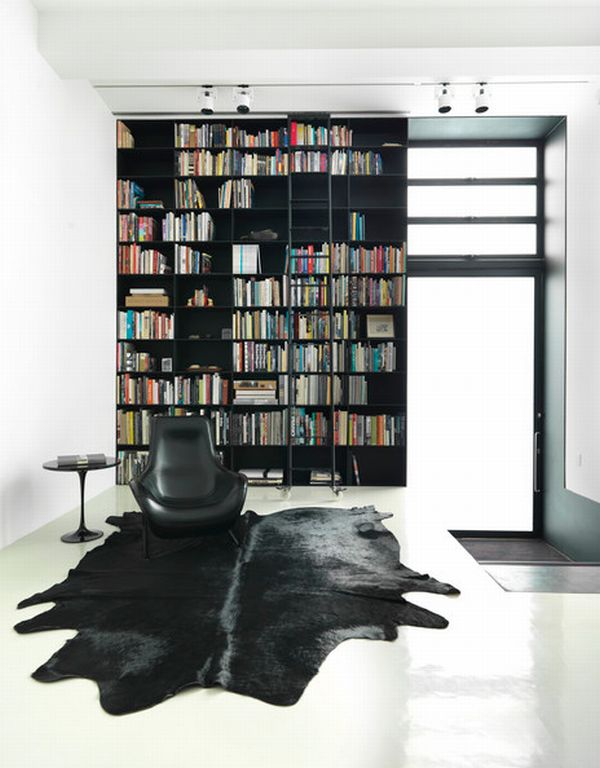 Ultra-sleek and chic all black shelf with white backdrop