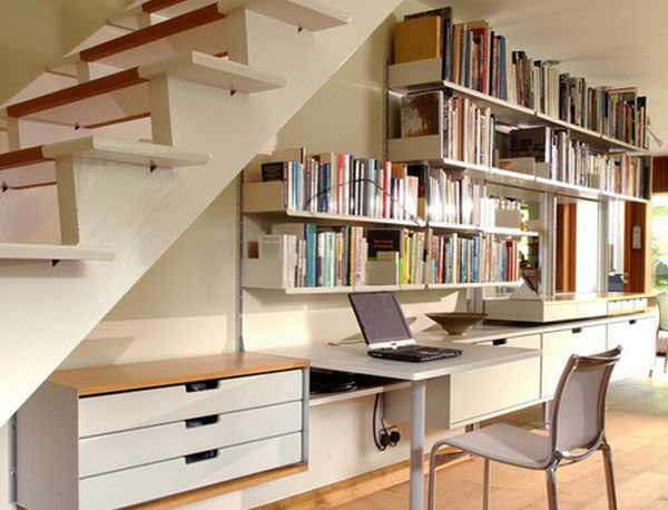 Utilize the room under the steps to stash away your books