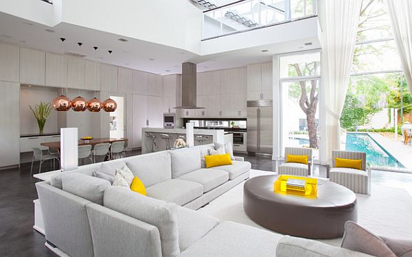 White contemporary living room decor with yellow accents