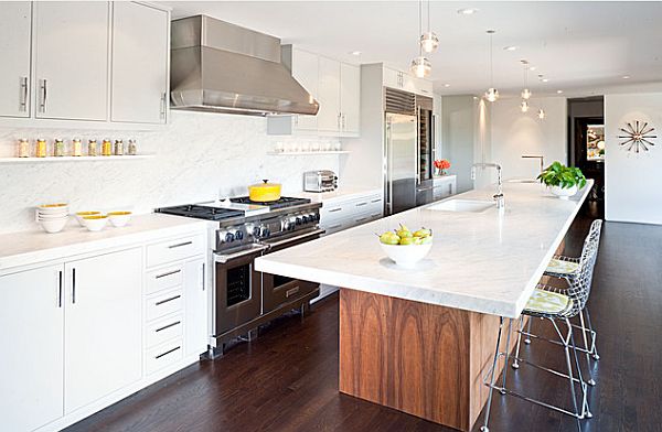 White kitchen remodeling with table like island with sink