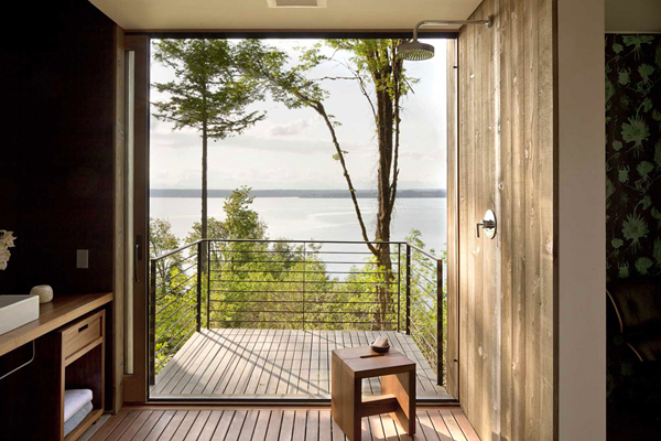 wood bathroom with balcony and staggering view