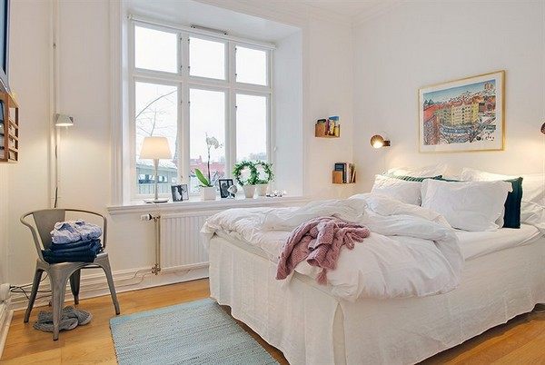 Scandinavian-bedroom-with-a-metal-chair