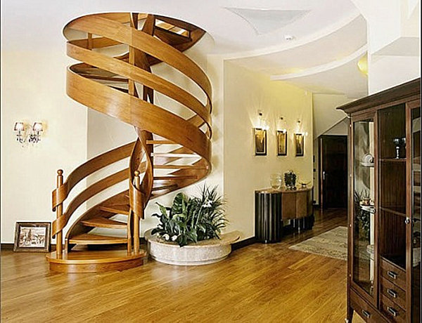Wooden spiral staircase with ribbon-like railing