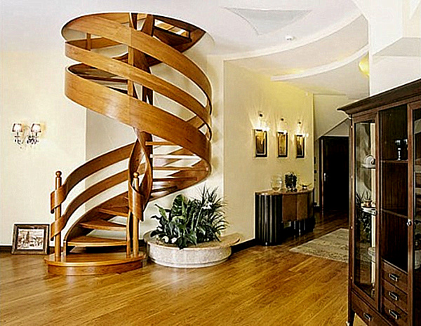 Wooden spiral staircase with ribbon-like railing