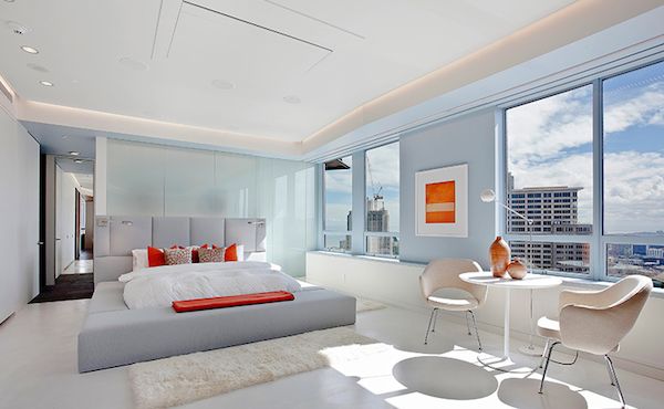 lavish white bedroom in stylish penthouse