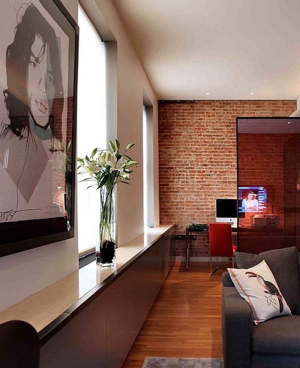 living room home office space with brick wall