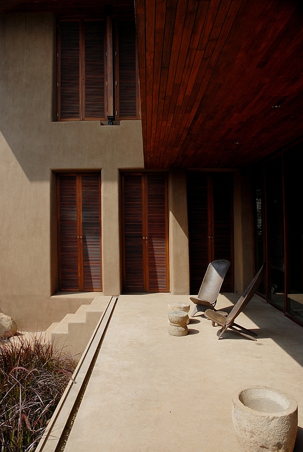 outdoor terrace with wooden chairs