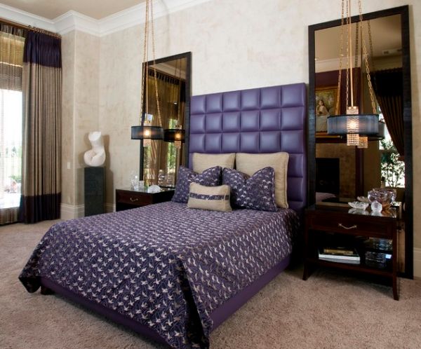 Alluring master bedroom with tufted headboard in brilliant and bright violet