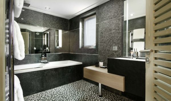 Bathroom with large stone bathtub