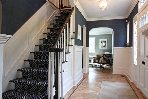 Beige entry way rug idea and dark rug on staircases