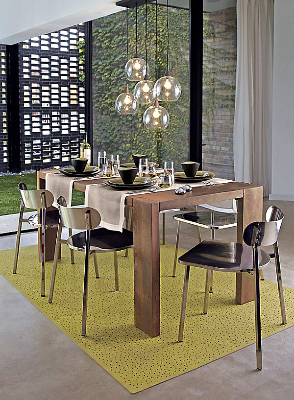 Brushed-nickel-chairs-and-a-wooden-Parsons-table