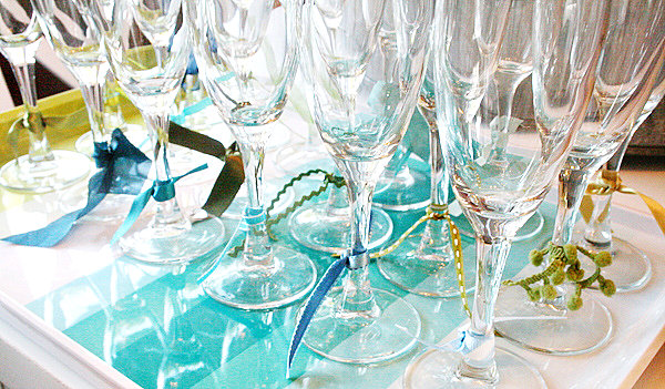 Champagne glasses embellished with ribbon