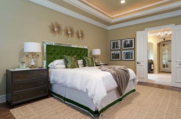 Ergonomic master bedroom with lively green tufted headboard stealing the show