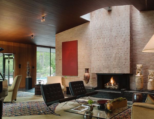Living Room with subtle placement of Skylight around the fireplace chimney