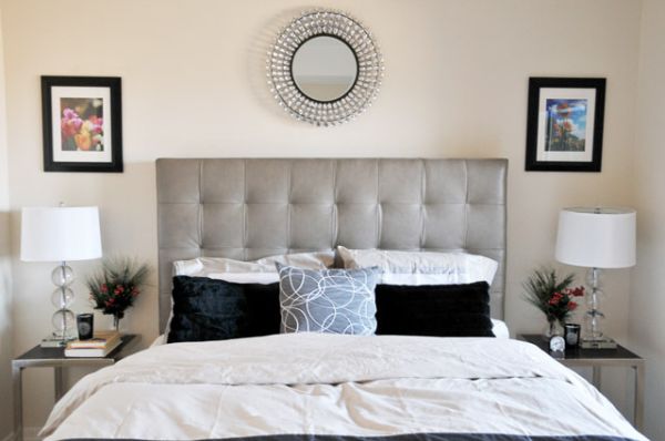 Modern bedroom sporting tufted headboard in neutral colors