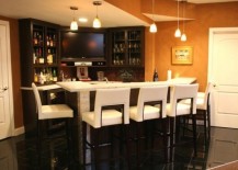 Modern-home-bar-with-pristine-white-seating-options-and-countertop-217x155