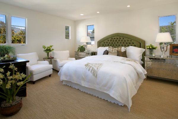 Picture perfect bedroom in Vegas sporting an olive green tufted headboard for the bed