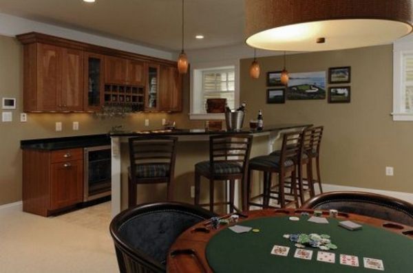 Poker table replaces the popular pool table at this home bar