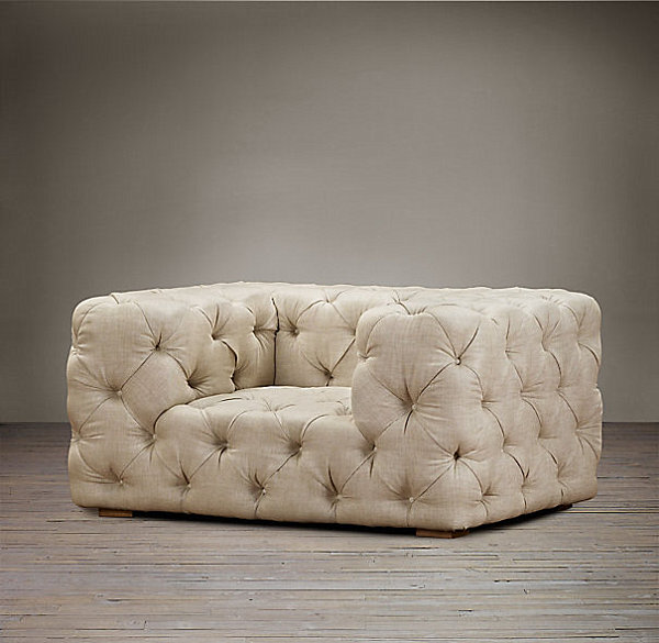 Upholstered chair with many tufts