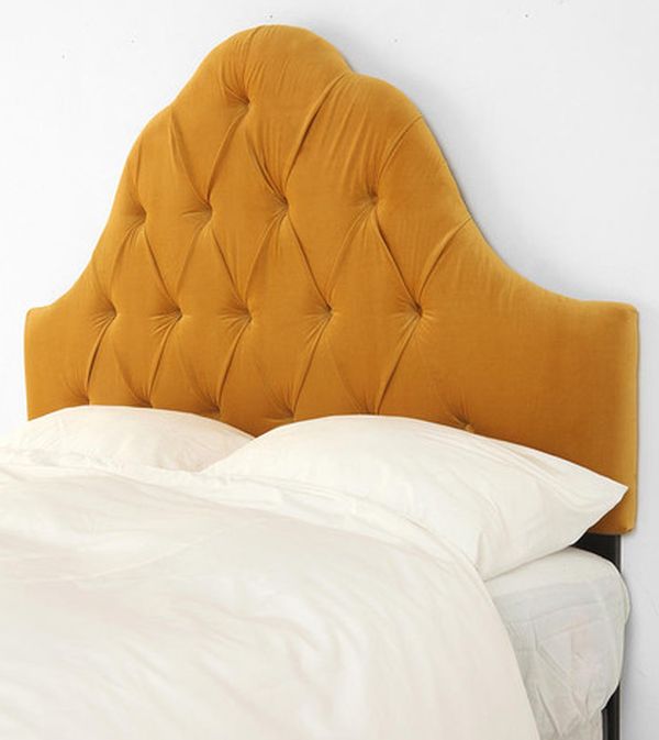 Velvet tufted headboard in antique gold