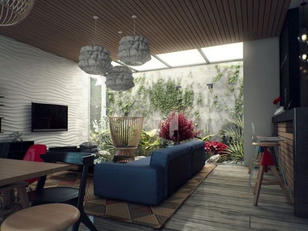 Vivacious living space that invites in nature supplemented by interesting skylight use