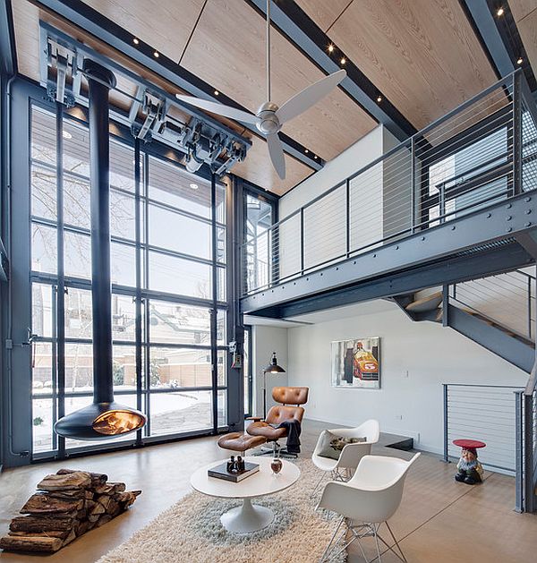 steel and glass living room with suspended fireplace