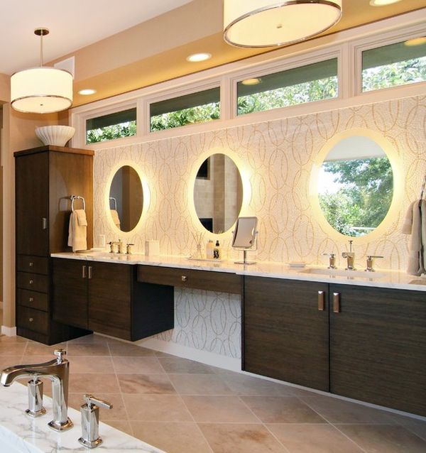 Breathtaking lighting and beautiful vanity give this bathroom a relaxing and refreshing atmosphere