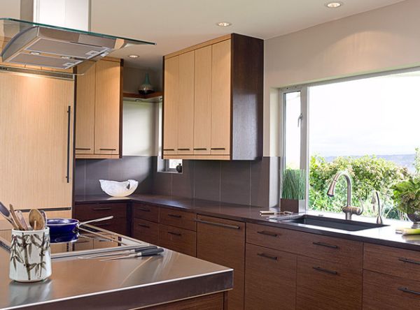 Compact Asian kitchen designw ith dark and light bamboo cabinets perfect for modern urban lofts
