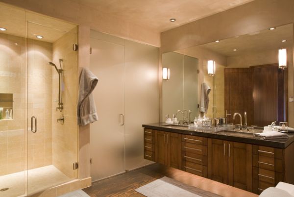 Contemporary bathroom with elaborate vanity design lit up fashionably