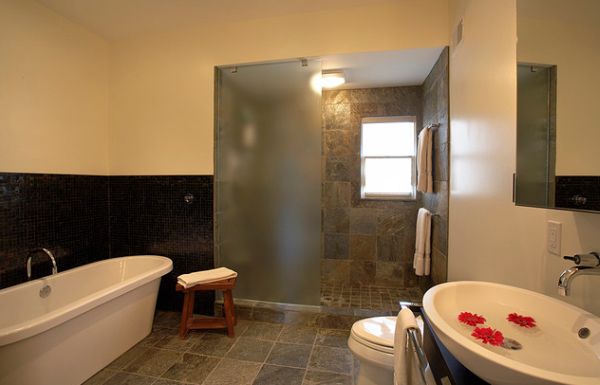 Frosted glass shower panel and doors give this bathroom a tranquil atmosphere