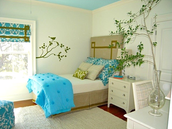 Girl's room with tree decal