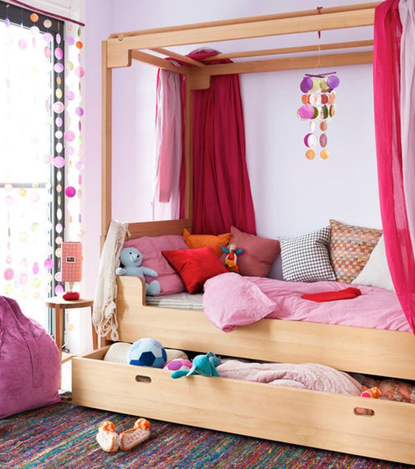 Gorgeous kids bedroom with vivacious colors and a cool trundle bed