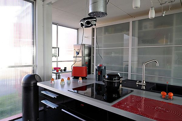 Modern kitchen with an organized stainless steel countertop