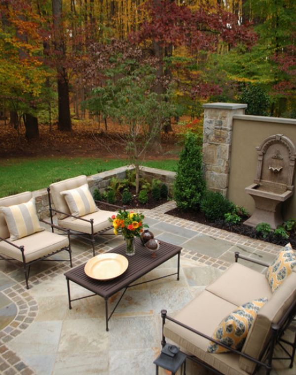 A Roman style patio design with a Mosaic pattern floor