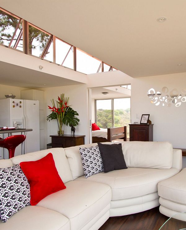 Plush couch along with skylights offer an airy feel