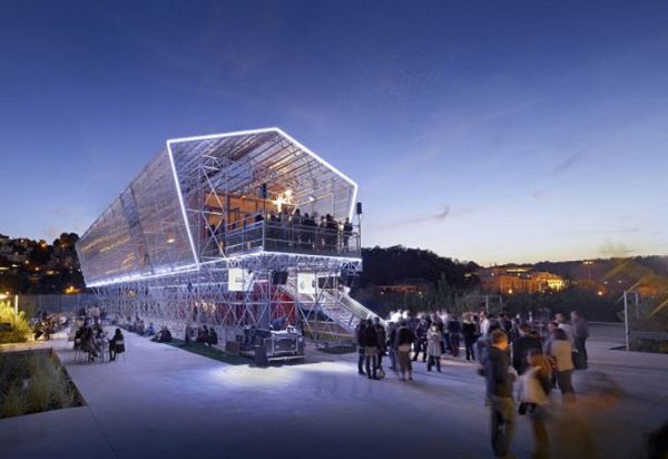 Shipping container unit encapsulated in a glass exterior