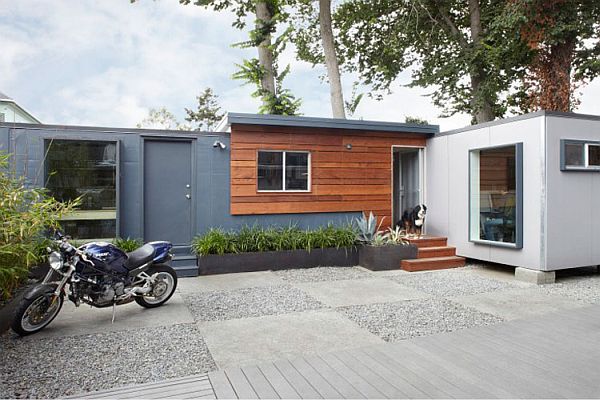 Simple setting and space conscious design make the shipping container office perfect for small businesses