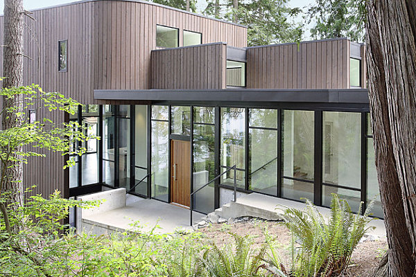 Solid wooden door surrounded by glass windows