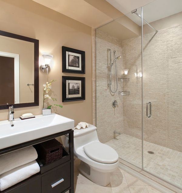 Spacious modern bathroom with frameless shower enclosure in glass