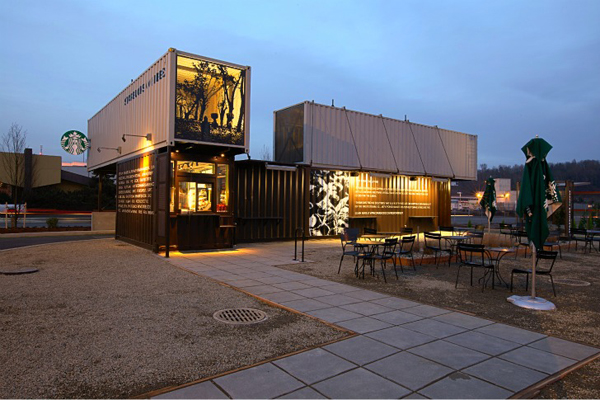 Starbucks crafted from shipping containers with seating space outside