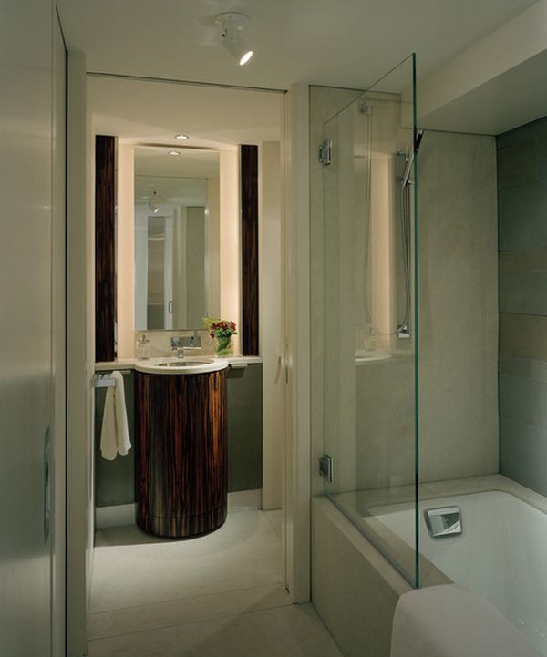 Stylish glass shower enclosure that saves up on space in a smart fashion