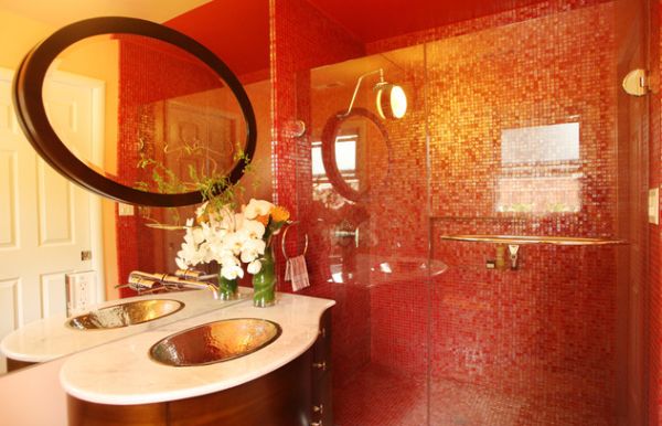 Vivid and vivacious bath uses red tiles and glass shower doors to create an Asian styled bath