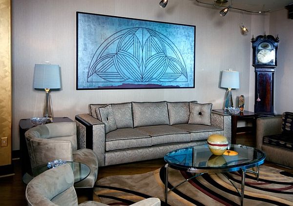 Art deco living room with silver couch and blue painting